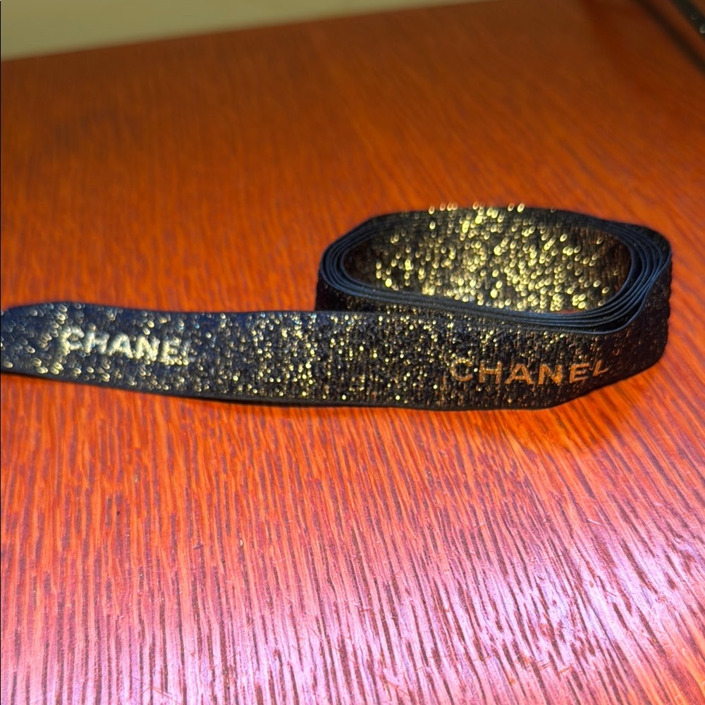 Chanel Black and Gold Ribbon
